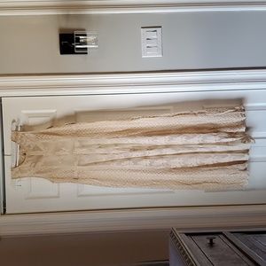 Forever 21 beige lace dress. Size small. See through. Never worn. New with tags.
